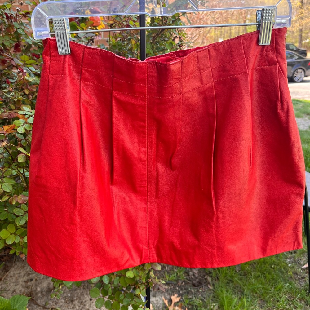 100% red leather mini skirt waist 15in length 14.5in